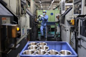 China's Factories Push Forward Amid Global Tensions and Local Challenges