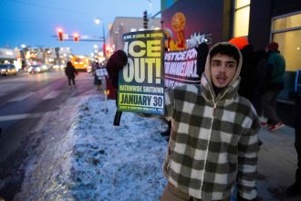 Minneapolis Activists Use Encrypted Apps to Track Federal Immigration Raids as Community Tensions Rise