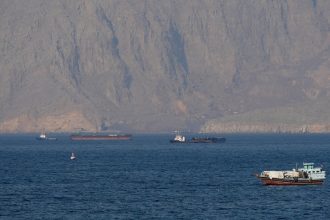 iran warns us to stay out of hormuz as trump pushes ship escort plan