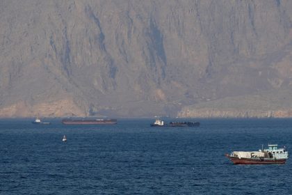 iran warns us to stay out of hormuz as trump pushes ship escort plan