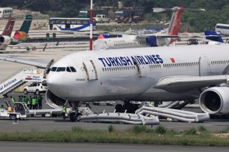 Turkish Airlines flight safely evacuated after landing gear fire briefly shuts Kathmandu airport