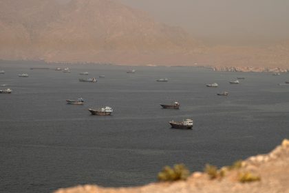 Strait of Hormuz Escort Operations Paused After Commercial Ship Hit in Suspected Attack Near Oman