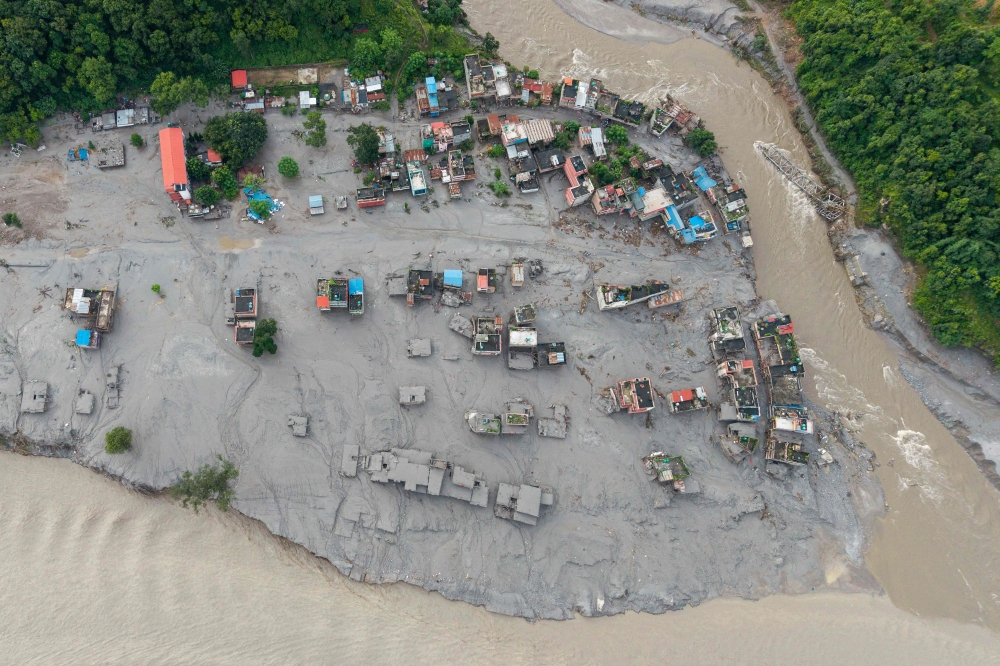 Nepal-Tibet disaster floods, landslides and a growing search for missing victims